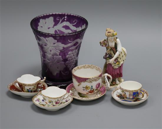 Four Dresden miniature cups and saucers, a wheel engraved vase and a porcelain figure of a lady